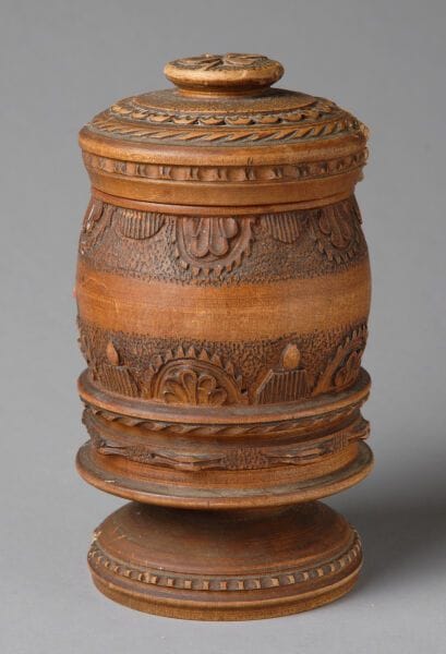 Tobacco jar, urn-shaped, finely carved from...