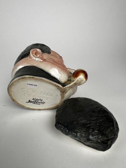 Tobacco Jar
Barbotine, 20th century
Jar depicting...