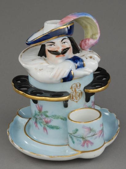 A tobacco jar whose body—made of sky-blue...