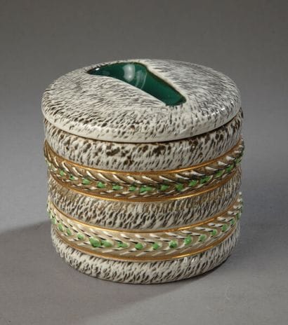 Cylindrical tobacco jar with gray-green and...