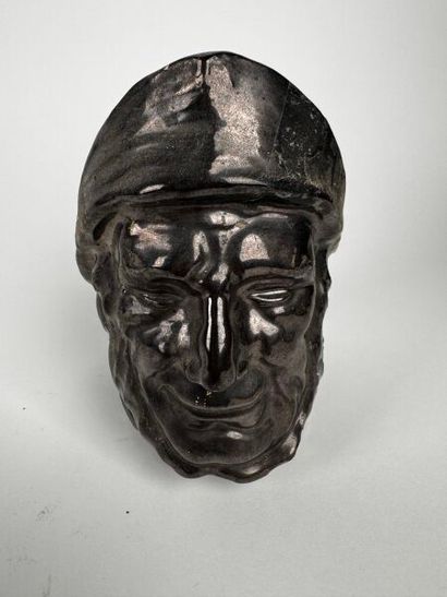 Tobacco jar
Anthracite-gray glazed earthenware...