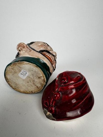 Tobacco jars 
One depicts the head of a mustachioed,...