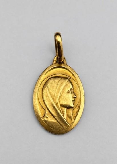 Une médaille or 18k 3,7 grs