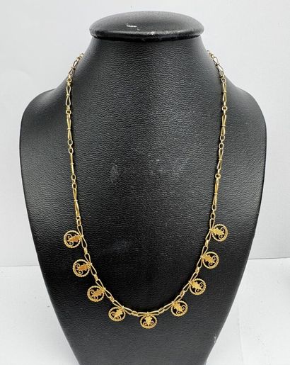 Un collier or 18k 11,1gr marqué au poids