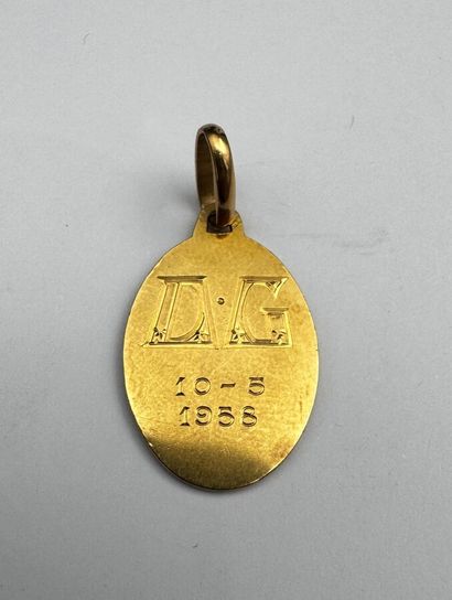 Une médaille or 18k 3,7 grs