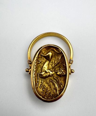 Bague en or 18k composée d'un seau représentant...