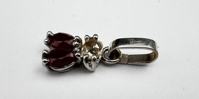 Pendentif or, sertissant deux rubis surmontés...
