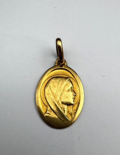 Une médaille or 18k 3,7 grs