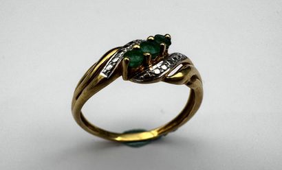 Bague en ors bicolores 18k ornée d'un ligne...