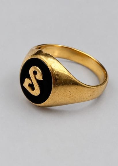 Chevalière or et onyx, marquée 