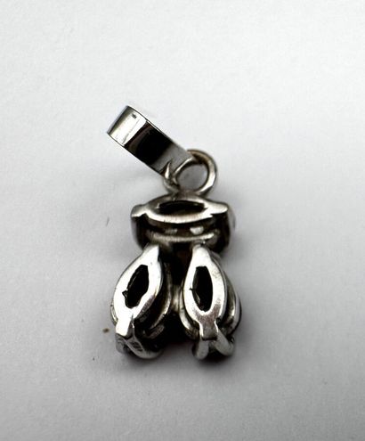 Pendentif or, sertissant deux rubis surmontés...