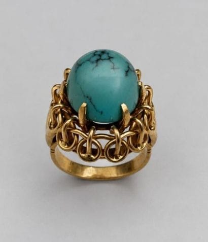 Bague or jaune surmontée d'un cabochon de...