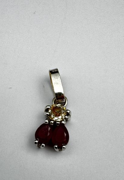 Pendentif or, sertissant deux rubis surmontés...