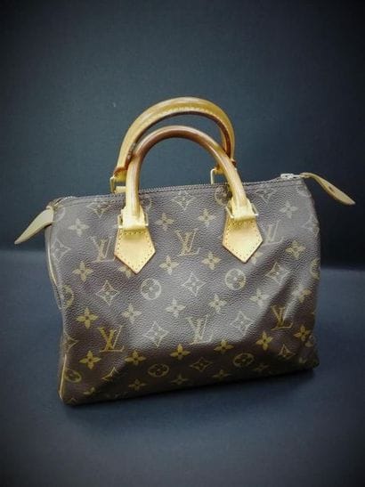 LOUIS VUITTON. Speedy 
 sac en toile enduite...
