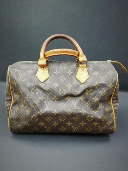 LOUIS VUITTON. Speedy 
 toile enduite monogrammée-...