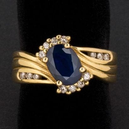 Bague ruban saphir entourage diamant taille...