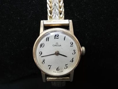 OMEGA
Boitier de montre en or, bracelet en...