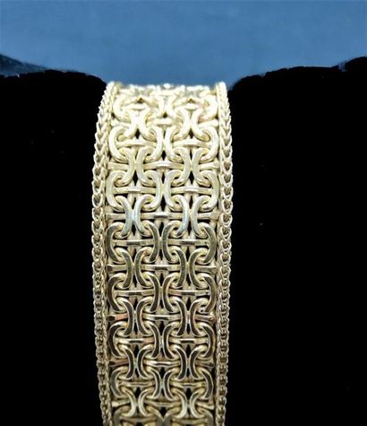 (AC) Bracelet articulé en or 
Poids: 67.6...