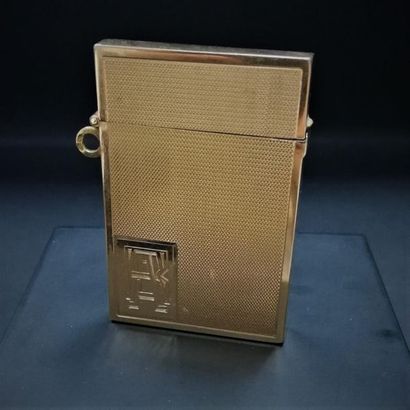 Briquet en or monogrammé
Poids: 25.4 g n...