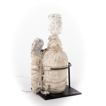 FON - BENIN 

Bottle filled with medicine...