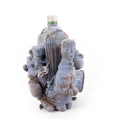 FON- BENIN 

Bottle of schnapps filled with...