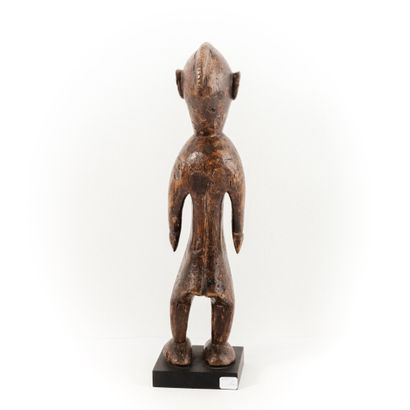 KAKA- NIGERIA

Personnage féminin avec une...