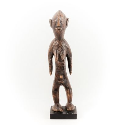 KAKA- NIGERIA

Personnage féminin avec une...