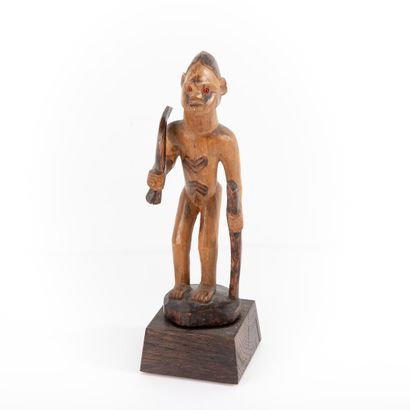 BEMBE - CONGO RDC 

Personnage portant canne...