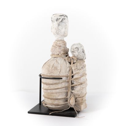 FON - BENIN 

Bottle filled with medicine...