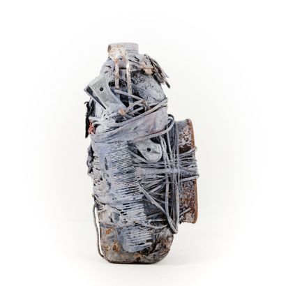 FON- BENIN 

Bo bottle filled with a medicinal...