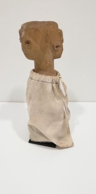 FON-BENIN 

Four-headed character, one of...