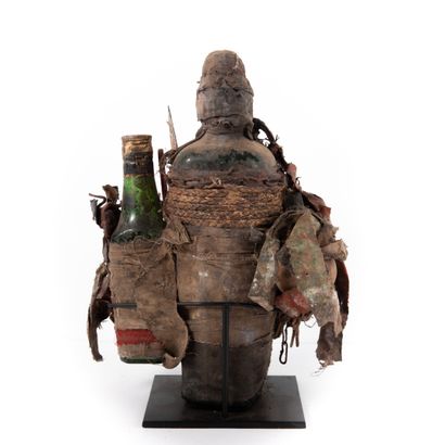 FON - BENIN 

Bottle filled with medicine...