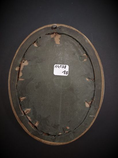 Oval earthenware medallion with polychrome...