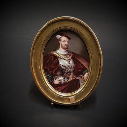 Oval earthenware medallion with polychrome...