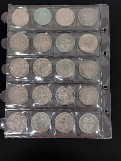 A sheet with 20 silver coins, modules and...