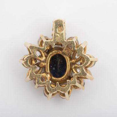Sapphire daisy pendant surrounded by brilliant-cut...