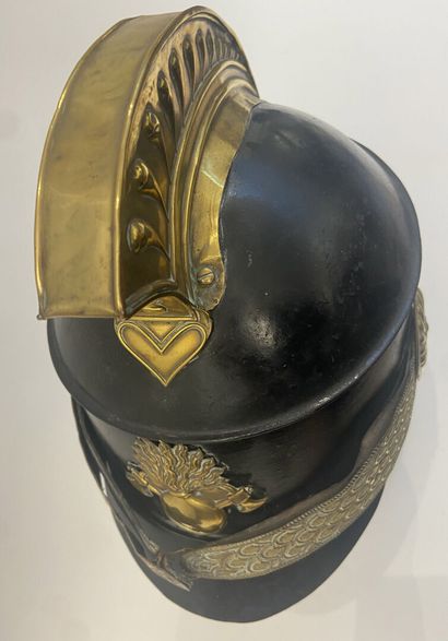 Fireman's crest helmet, blackened iron sheet...