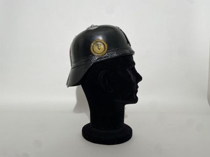 Leather helmet of fireman of a German city...