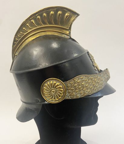 Fireman's crest helmet, blackened iron sheet...
