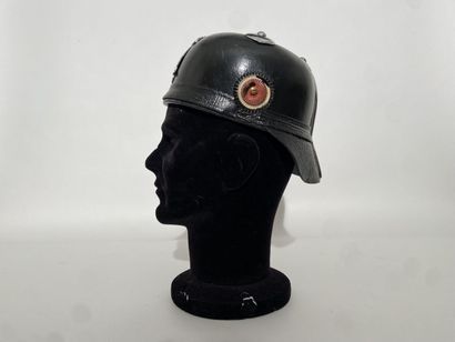 Leather helmet of fireman of a German city...