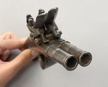 Nice flintlock pocket pistol with two tabletop...