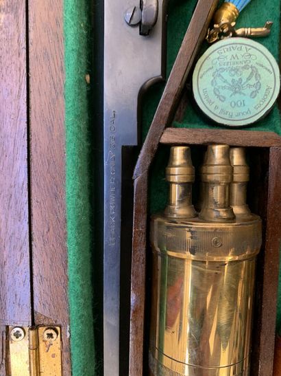 Wooden case dressed with green felt containing,...