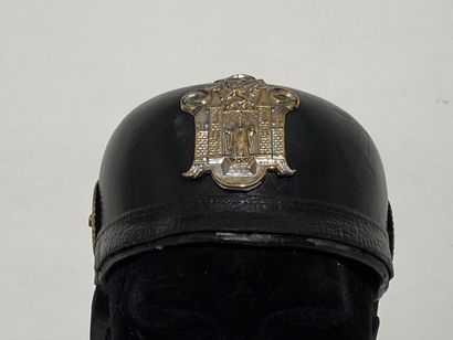 Leather helmet of fireman of a German city...