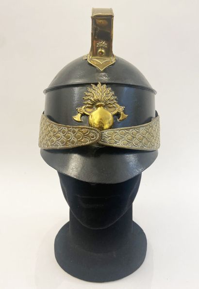 Fireman's crest helmet, blackened iron sheet...