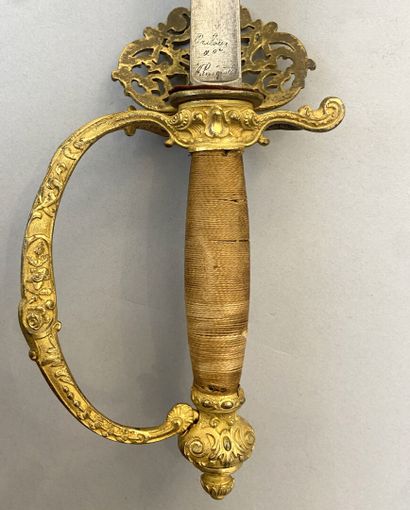 Lot of three swords of company : 
- a sword...