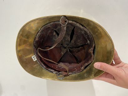 Fireman's helmet made of brass plate with...