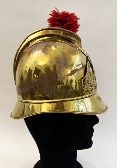 Brass firefighter helmet of the city of Cognac,...