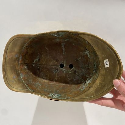 Hull of helmet of fireman bomb in brass crest...