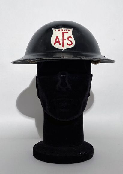 English Tin Hat painted in black with its...