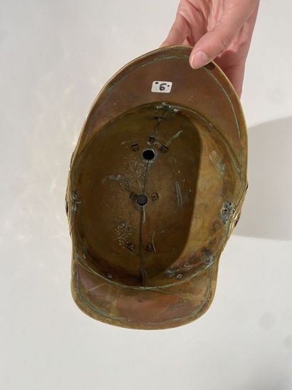 Brass bomb of fireman's helmet of the city...